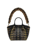 Black handbag with gold pattern and decorative handle on a white background