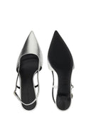 Pair of silver and black pointed-toe shoes on a white background