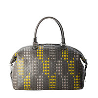 The sleek and spacious travel bag in black Mosaico nappa leather